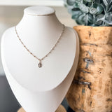 Miraculous Medals, known as a symbol of protection, guidance, and grace. Charm placed on a mixed metal delicate link chain. 