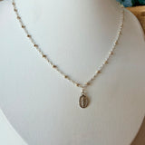 Miraculous Medals, known as a symbol of protection, guidance, and grace. Charm placed on a mixed metal delicate cable chain - Silver with gold beads.