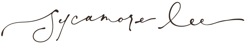 Signature in brown ink on a white background